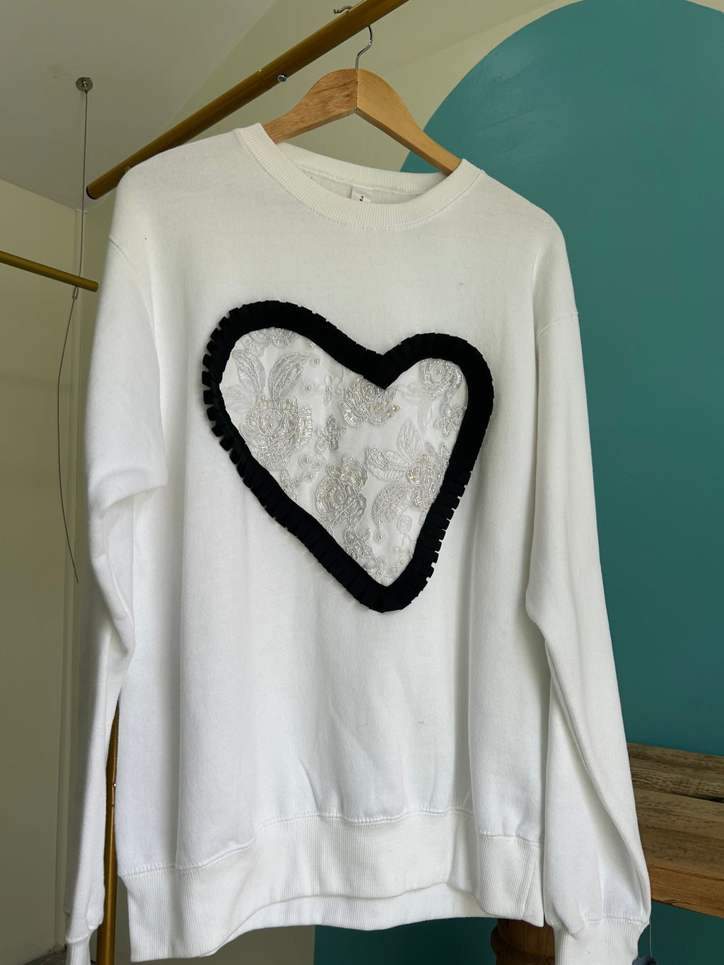 Ruffled lace crewneck sweater